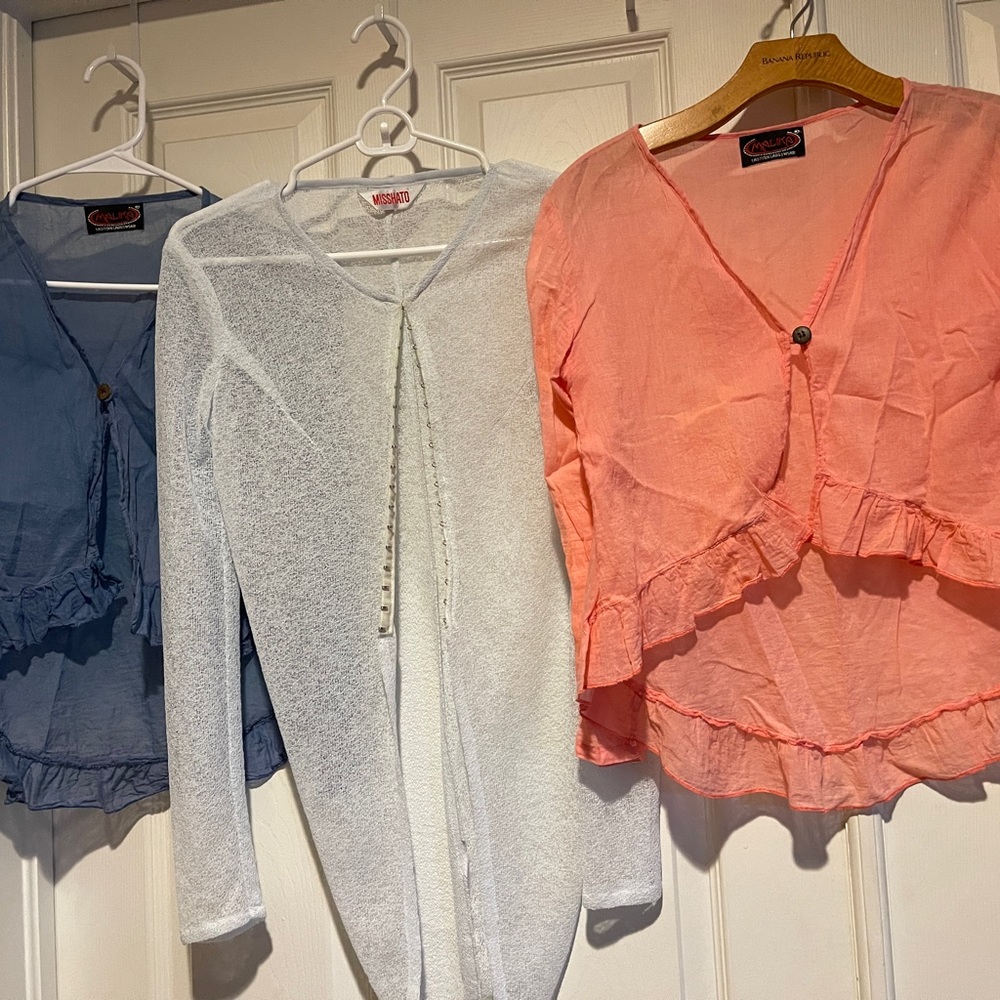 A cotton dress with three cardigans.